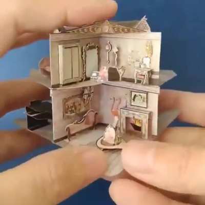 "Dollhouse inside a tiny book "