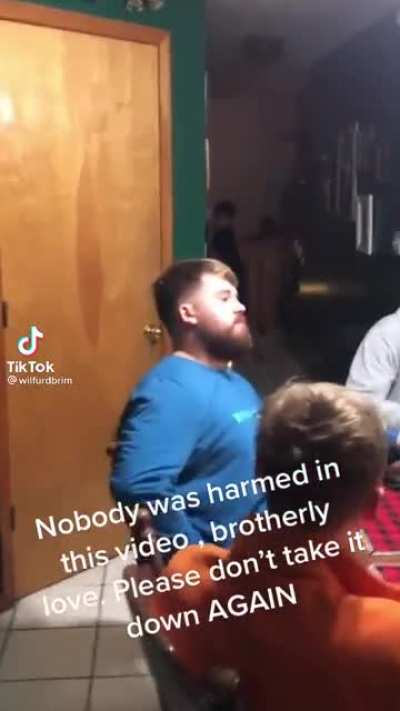 Dewey lookalike slaps his brother in the face