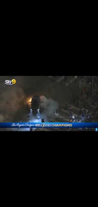 Doing donuts over fireworks after Dodgers win the World Series
