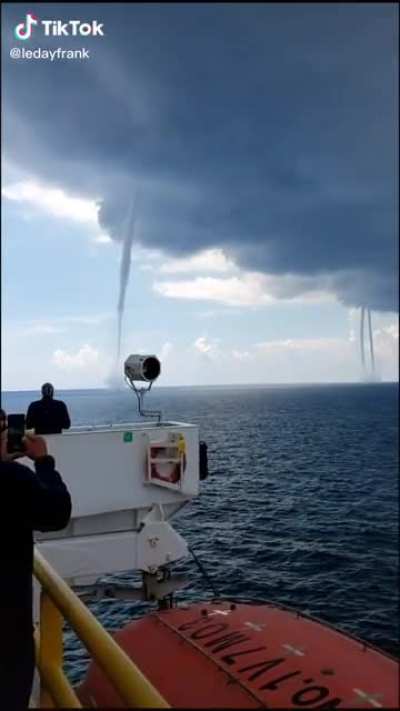 ? 5 Waterspouts coming out the clouds in the Gulf of Mexico