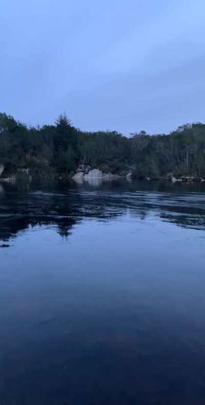 Stone on frozen water.