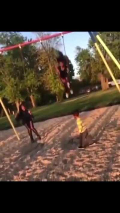 Kid near swings