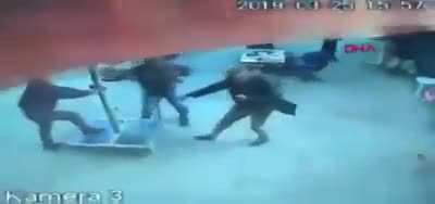 The man who wants to prevent the umbrella from flying is flying with the umbrella