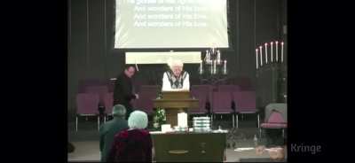 guy breaks candles in church, yes you heard it correctly