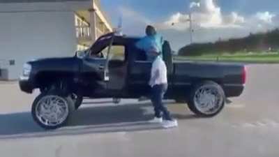 Dancing alongside a moving car