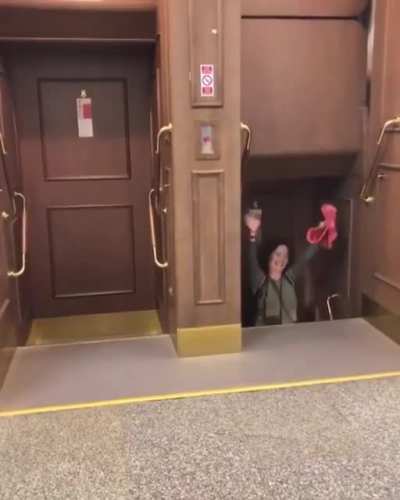 This old-school elevator is called a "paternoster" and is located in the Prague City Hall.