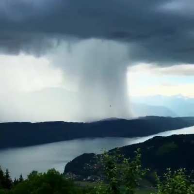 ? A stunning cloudburst over Lake Millstatt, Austria