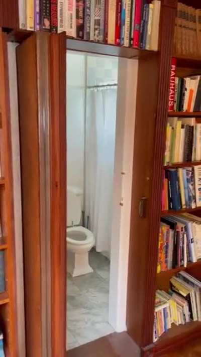 this bathroom hidden inside a home library ? @davidchoe