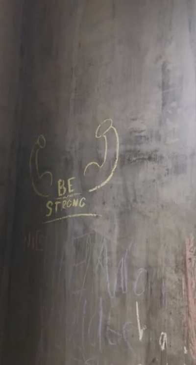 In the hospital parking garage, kids draw motivational pictures for us to get through another CoViD spike.