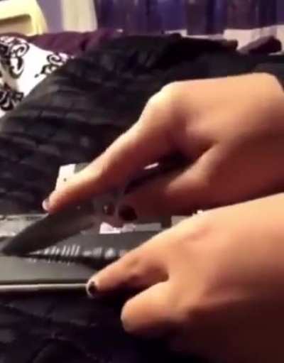 What could go wrong trying to cut a phone battery?