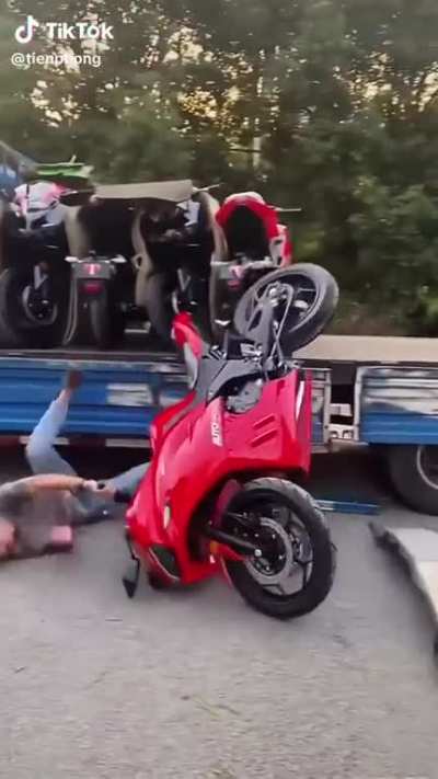 to unload a motorcycle