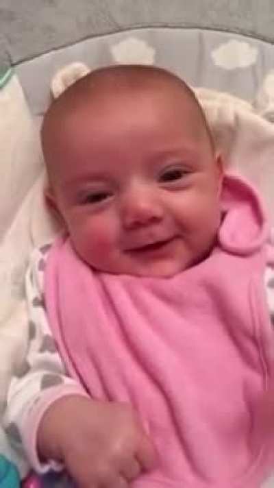 8 week old cute baby mimicking mom's "I love you".