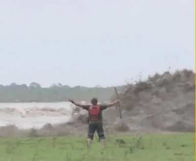 Playing Moses during a flash flood.