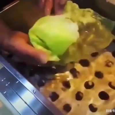 Making fake lettuce which is usually displayed in the windows of restaurants so you "know what you're going to eat" - Japan