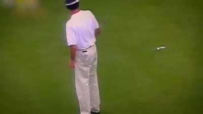 Throwing your golf club while the ball is still rolling