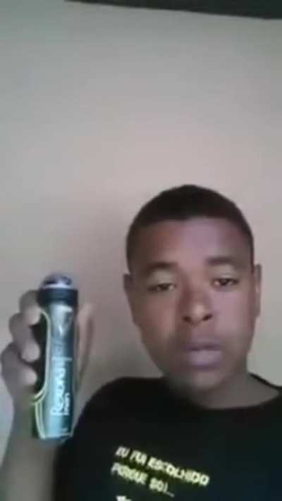 Guy sprays deodorant in his eyes