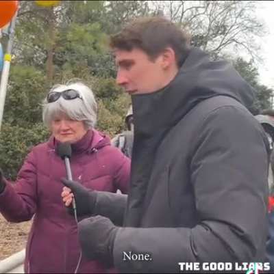 Protesting with a “choose adoption” sign