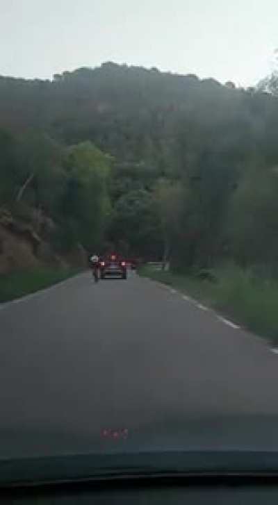 WCGW racing cars on a bike