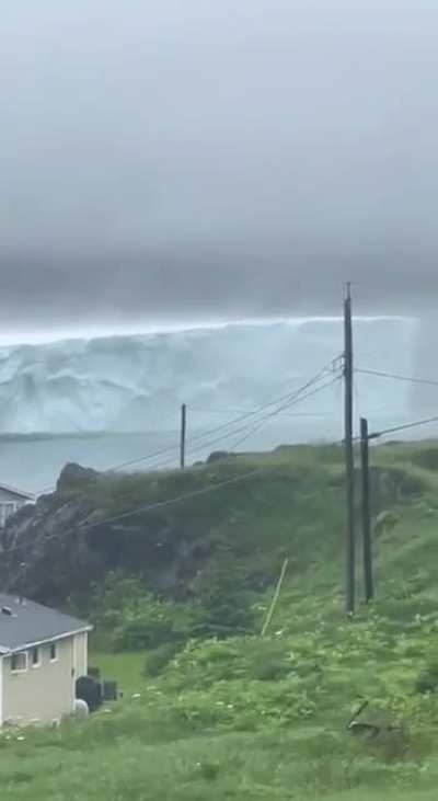 Omg ?, Canadian island of Newfoundland has been visited by a massive iceberg. The enormous block of ice broke off from Greenland and floated south via Iceberg Alley.