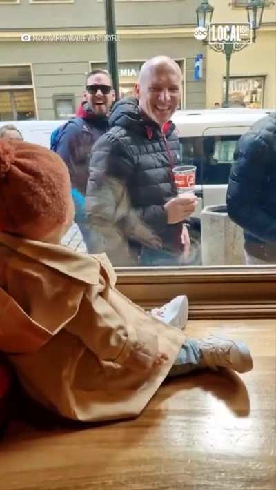 Baby girl making lots of new friends in Prague