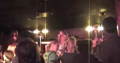 An unknown band called The Killers play their new song "Mr. Brightside" in 2002 (2 years before the release of Hot Fuss)