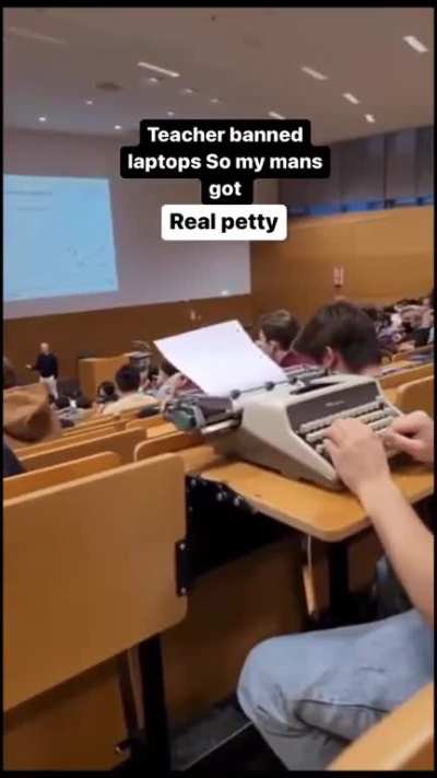 Teacher banned laptops