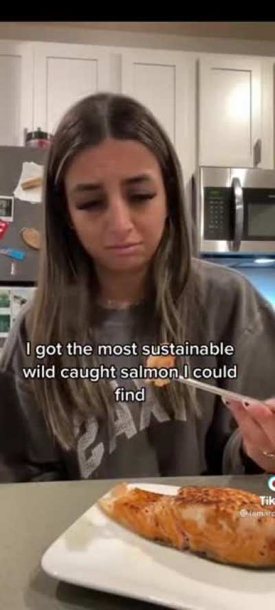 This girl filming herself cry over fish.