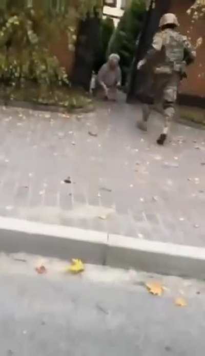 A Ukrainian soldier returns to his grandmother's home in Kherson