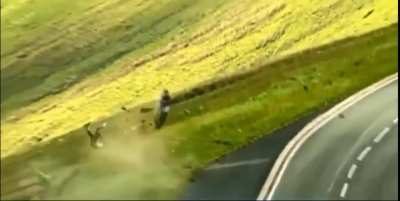 Riding a motorcycle near a cliff...