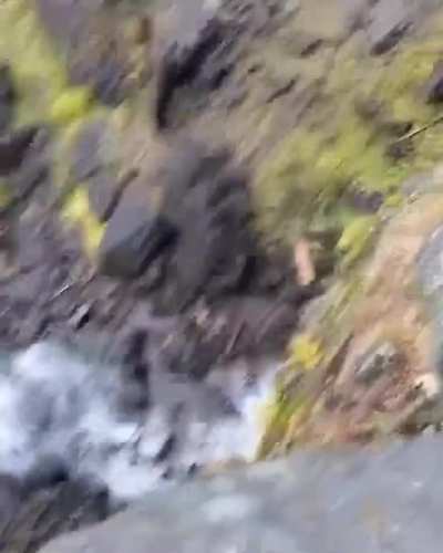 Boulder rolls off a cliff and is pulverized upon landing