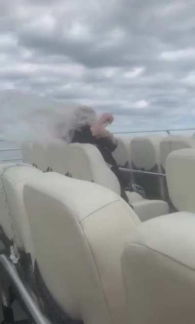 WCGW wearing a poncho in high winds