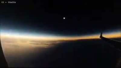 Solar eclipse occurring mid-flight