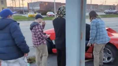 Boomer in sports car has mid-life crisis..... before and during the video.
