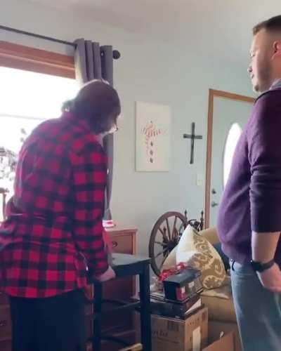 On Christmas morning after we had opened all the gifts, Travis said he had one more big gift for me. I was a little confused on why he had gotten me a barstool but once I sat down and looked at him, I immediately knew what was happening. He later told me