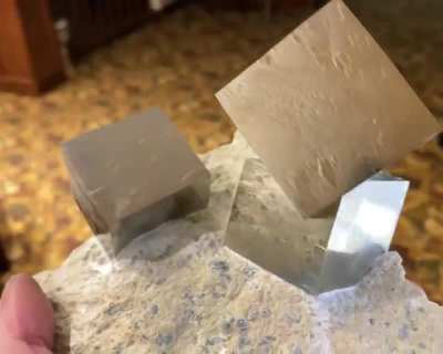 ? Near Perfect Cubes of Pyrite from a mine in Spain. These natural crystals have not been carved, cut, or polished and are shown just as they came from the earth. ?