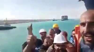 Egyptian crew of tug boat named Mashour celebrate after freeing of Ever Given by chanting "Mashour is number 1"