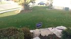 Neighbor tries to steal Trump yard sign that was connected to electric current.