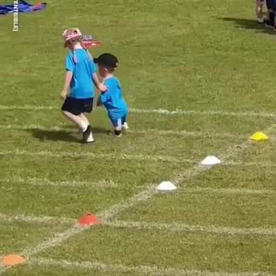 Nathan, 7, with dwarfism participated in his first sports day. He was offered a head start but refused as he wanted to be like his class and start with them. With Nathan falling begging his mate didn’t want him to be alone and finish last, so she stopped