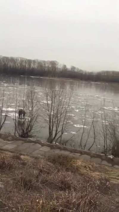 3 kids floating down a river on ice.