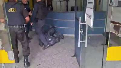 Taking the smuggling to the police station.