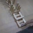 Toppling "dominoes"