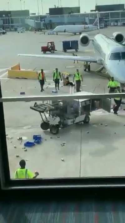 My immediate thought was put something under the tires, this guy took it to the next level and I applaud his efforts.