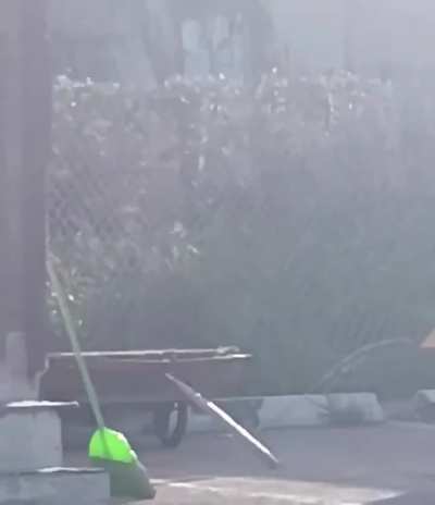 Homeless man in Compton, California builds a two story home in a parking lot, complete with windows, a chimney, and even a dog house right beside it