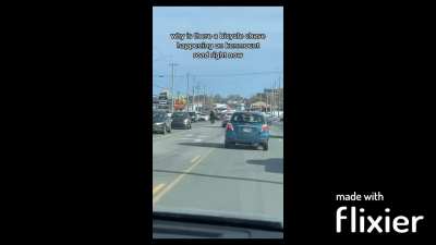 A Man That Just Committed Theft, Flees From Police On a Motorized Bicycle Through Traffic, In St Johns Newfoundland Canada.