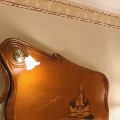 The headboards at Disney World do this when someone enters the room.