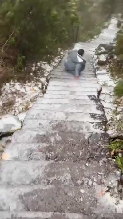 WCWG sliding on a snowy steps
