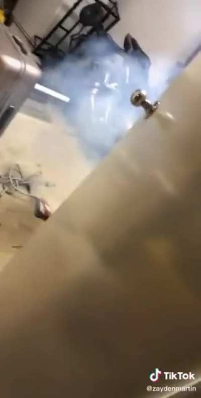 Trying to hit the phone with a hammer