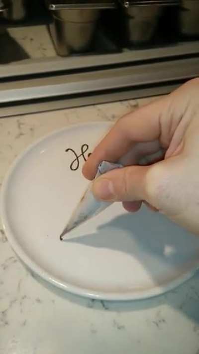 "Happy Birthday" beautifully written in chocolate