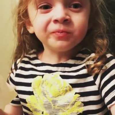 Daughter pretending to like spaghetti