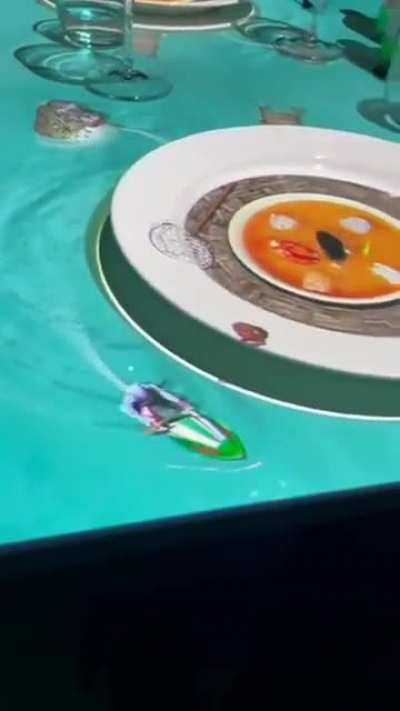 In a restaurant in Italy diners enjoy a video mapping on the table while they wait